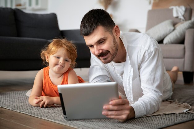 a littile girl with her father to learn Muslims Can Preserve Modesty and Morality in the Digital Age 